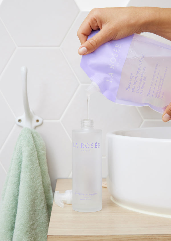 Duo Purifying Shampoo Refill with its refillable bottle